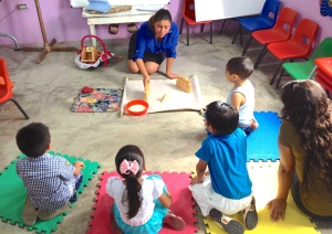 Zoila telling God's story to the little ones using AMO's "Wellspring of Wonder" ~ Villahermosa, Tabasco
